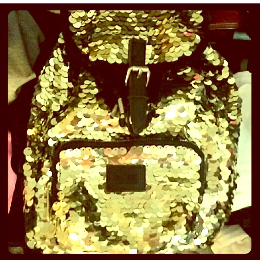 Victoria secret back pack. Gold sequence.